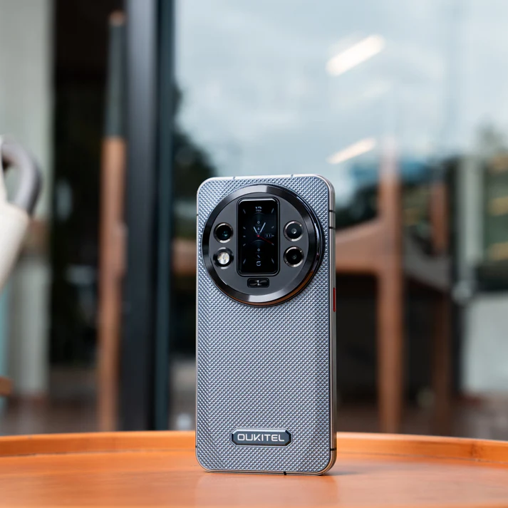 Phone case WP200 with OUKITEL branding on a wooden surface